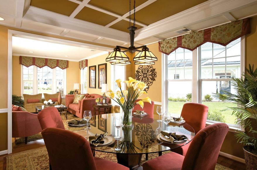 The Redmund model has a formal living room at the front of the house adjacent to the dining room with a coffered ceiling.