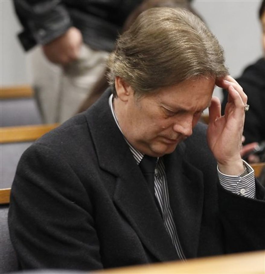 Keith Brown, right, and his attorney Steven Shapiro talk to the judge at his hearing in Provo 4th District Court in Provo, Utah, Thursday, Feb. 17, 2011. Brown, the father of the musical group "The 5 Browns," pleaded guilty to one first-degree felony count of sodomy on a child and two second-degree felony counts of sexual abuse of a child on his three daughters. Brown will be sentenced on March 31, 2011. (AP Photo/George Frey)