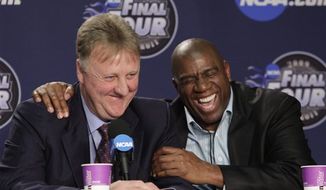 FILE - In this April 6, 2009 file photo, former NBA players Earvin &quot;Magic&quot; Johnson, right, and Larry Bird laugh at a news conference before the championship game between Michigan State and North Carolina at the men&#39;s NCAA Final Four college basketball tournament in Detroit. The producers and playwright behind the Broadway play &quot;Lombardi&quot; are planning to go from football to basketball with &quot;Magic/Bird,&quot; a new play that will chronicle the lives of Hall of Famers Larry Bird and Earvin &quot;Magic&quot; Johnson.  (AP Photo/Paul Sancya, file)