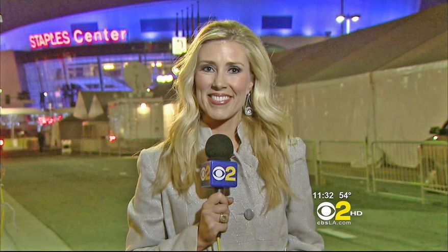 ** FILE ** In this Sunday, Feb 13, 2011, undated handout file photo provided by KCBS in Los Angeles, veteran TV journalist Serene Branson reports on the Grammy awards show outside the Staples Center in Los Angeles. Branson's speech became incoherent during the stand-up, which fueled Internet speculation that she suffered an on-air stroke. Doctors said Thursday that she suffered a migraine, the symptoms of which can mimic a stroke. (AP Photo/KCBS TV)