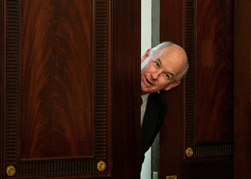 P.J. Crowley, communications director at the State Department, peeks out of a doorway of the Franklin Room at the Department of State in Washington. Diplomacy has stepped up online efforts as Facebook, YouTube, Flickr and Twitter play a growing role in world events. Mr. Crowley has tweeted to knock down rumors, amplify U.S. positions, appeal for calm and urge reforms in Haiti, Tunisia and Lebanon. (Associated Press)