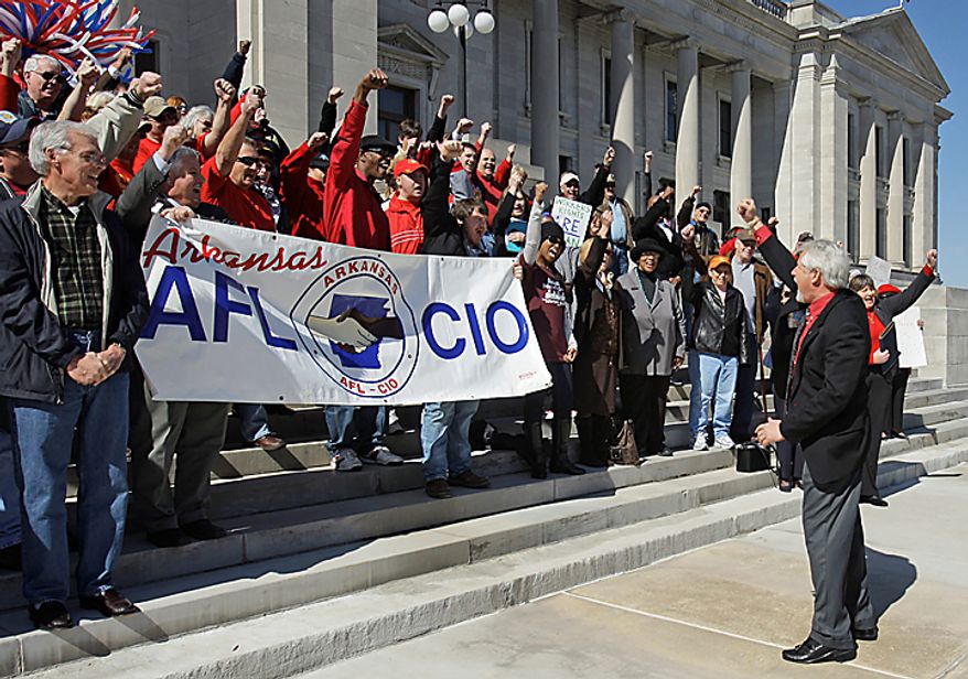 Alan Hughes (right), Arkansas AFL-CIO president, leads a rally in support of Wisconsin union members at the Arkansas state Capitol in Little Rock, Ark., on Tuesday, Feb. 22, 2011. (AP Photo/Danny Johnston)