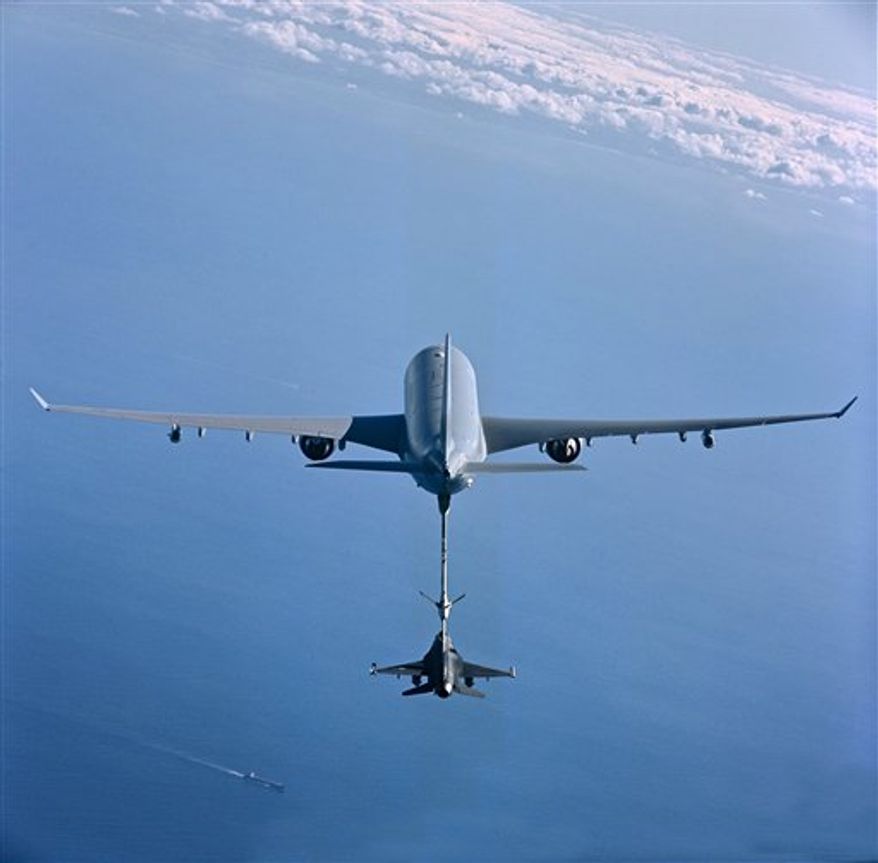 This undated photo provided by European Aeronautic Defense and Space Company (EADS) shows an aerial refueling tanker aircraft, that EADS North America has offered to the U.S. Air Force as the KC-45, as it refuels an F-16 fighter aircraft via a refueling boom system. EADS is competing with Boeing Co. to win a $35 billion contract to build nearly 200 giant airborne refueling tankers, to replace the Air Force's Eisenhower-era KC-135 planes. If EADS wins, the tanker would be assembled in Mobile, Ala., at the former Brookley military base, shuttered in the 1960s. Either way, about 50,000 jobs would be created in the U.S. (AP Photo/EADS North America) NO SALES.