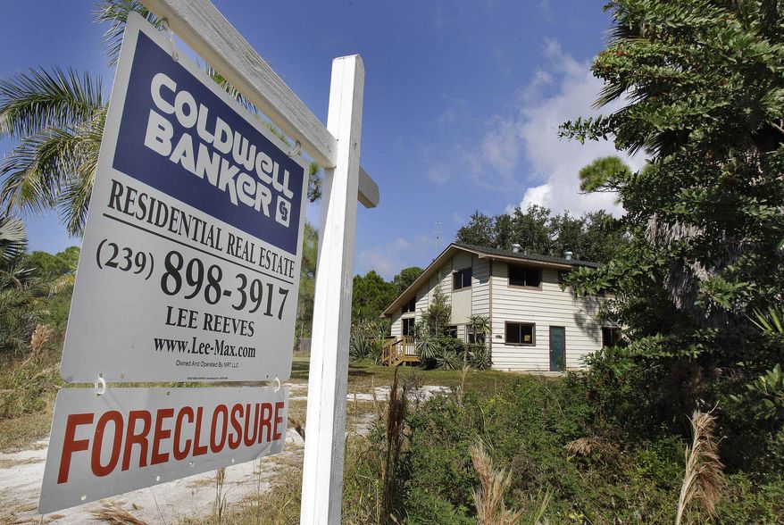 ** FILE ** A foreclosed home is shown on Pine Island in Lee County, Fla., in November 2010. (AP Photo/Chris O'Meara, File)