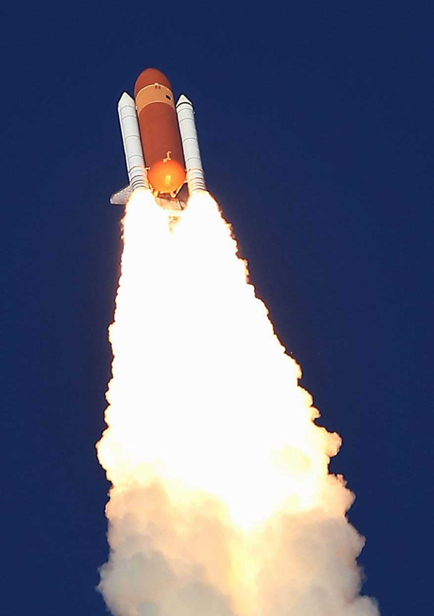 Space shuttle Discovery lifts off from Pad 39A at the Kennedy Space Center in Cape Canaveral, Fla., Thursday, Feb. 24, 2011. Discovery, on its last mission, will carry a crew of six astronauts to the Leonardo Permanent Multipurpose Module, or PMM, to the International Space Station. (AP Photo/Wilfredo Lee)