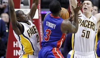 Detroit Pistons forward Tayshaun Prince, right, drives on Indiana Pacers forward Danny Granger in the first half of an NBA basketball game in Indianapolis, Wednesday, Feb. 23, 2011.  (AP Photo/Michael Conroy)
