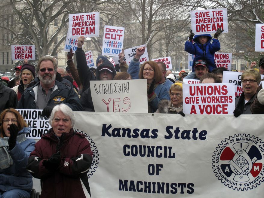 Hundreds of Kansans participate in a pro-union rally on Saturday, Feb. 26, 2011, on the south steps of the Statehouse in Topeka, Kan. (AP Photo/John Hanna)