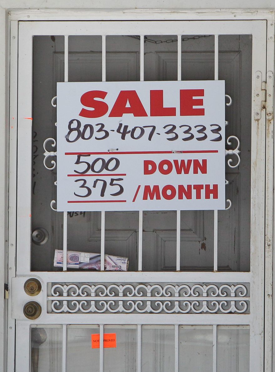 A sign in the Detroit suburb of Southfield, Mich., shows the depressed state of local housing, which has attracted low-income buyers and renters from the inner city into the middle-class enclave. (Associated Press)