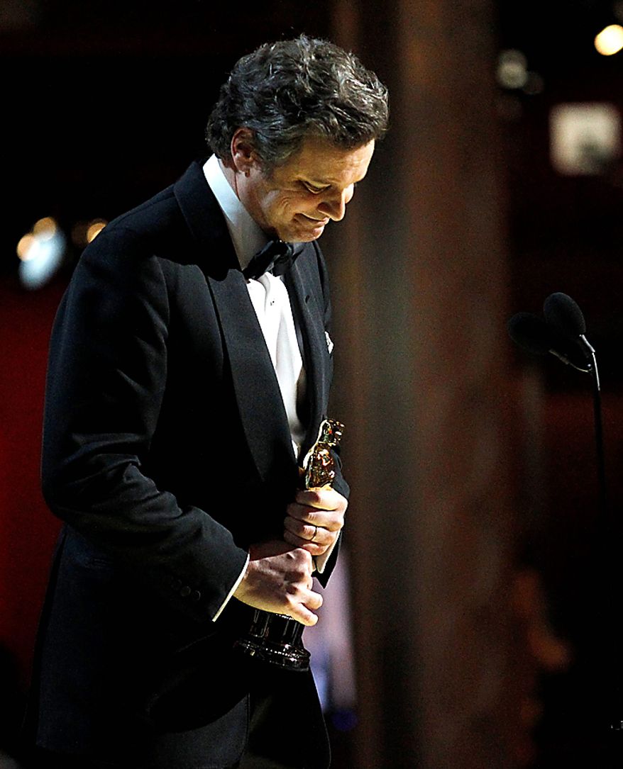 Colin Firth accepts the Oscar for best performance by an actor in a leading role for "The King's Speech" at the 83rd Academy Awards on Sunday, Feb. 27, 2011, in the Hollywood section of Los Angeles. (AP Photo/Chris Carlson)