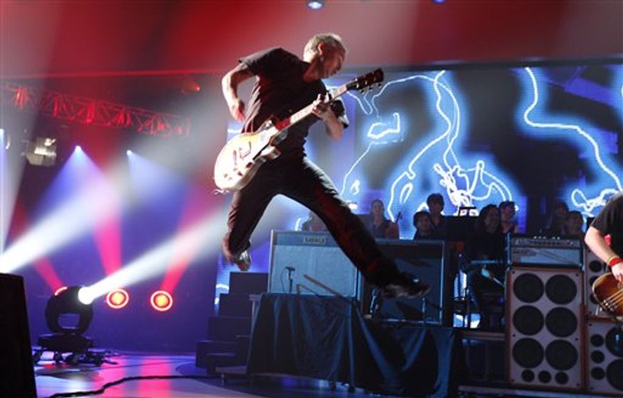 FILE - In this July 12, 2008 file photo, Pearl Jam performs at the VH1 Rock Honors The Who? in Los Angeles. Pearl Jam is among the acts that have signed on to Patagonia's new music initiative, where fans can get exclusive tracks from their favorite acts, and the profits go to green causes. (AP Photo/Matt Sayles, File)