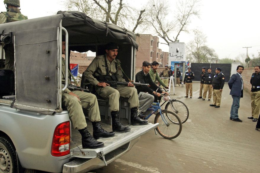 Security is beefed up Thursday outside the central jail in Lahore, Pakistan, where a trial court said it would proceed with the murder trial of CIA contractor Raymond Allen Davis. (Associated Press)