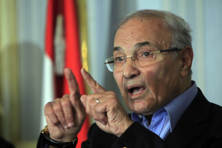 ** FILE ** In this Sunday, Feb.13, 2011, file photo Egyptian Prime Minister Ahmed Shafiq talks during a press conference in Cairo, Egypt. Egypt's military rulers say on Thursday, March 3, 2011, Egyptian Prime Minister Ahmed Shafiq has resigned. (AP Photo/Amr Nabil)