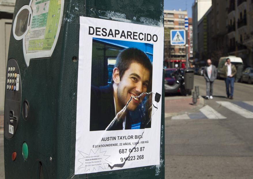 ** FILE ** A poster of missing 22-year-old U.S. exchange student Austin Bice is displayed on a parking meter in Madrid on Sunday, March 6, 2011. Police, family and friends have stepped up the search for the San Diego State University student, who went missing after visiting a nightclub more than a week ago. (AP Photo/Paul White)