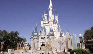 This Jan. 26, 2006, file photo shows Cinderella&#39;s Castle at Walt Disney World&#39;s Magic Kingdom in Lake Buena Vista, Fla. (AP Photo/Reinhold Matay, File)