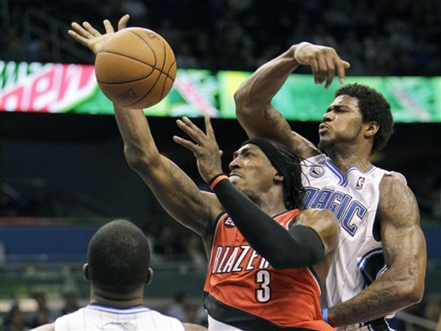 Orlando Magic coach Stan Van Gundy questions a call by an official during the second half of an NBA basketball game against the Portland Trail Blazers in Orlando, Fla., Monday, March 7, 2011. Portland won 89-85. (AP Photo/John Raoux)
