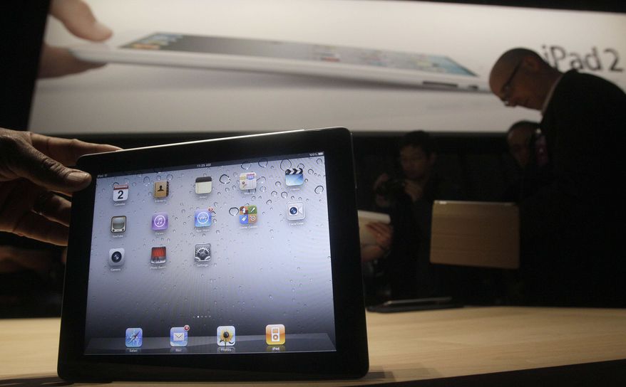 The iPad 2 is shown at an Apple event after the Yerba Buena Center for the Arts Theater in San Francisco, Wednesday, March 2, 2011. (AP Photo/Jeff Chiu)