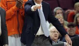 Syracuse coach Jim Boeheim  gives his team direction during the first half of an NCAA college basketball game against St. Johns at the Big East Championship, Thursday, March 10, 2011 at Madison Square Garden in New York.   (AP Photo/Mary Altaffer)