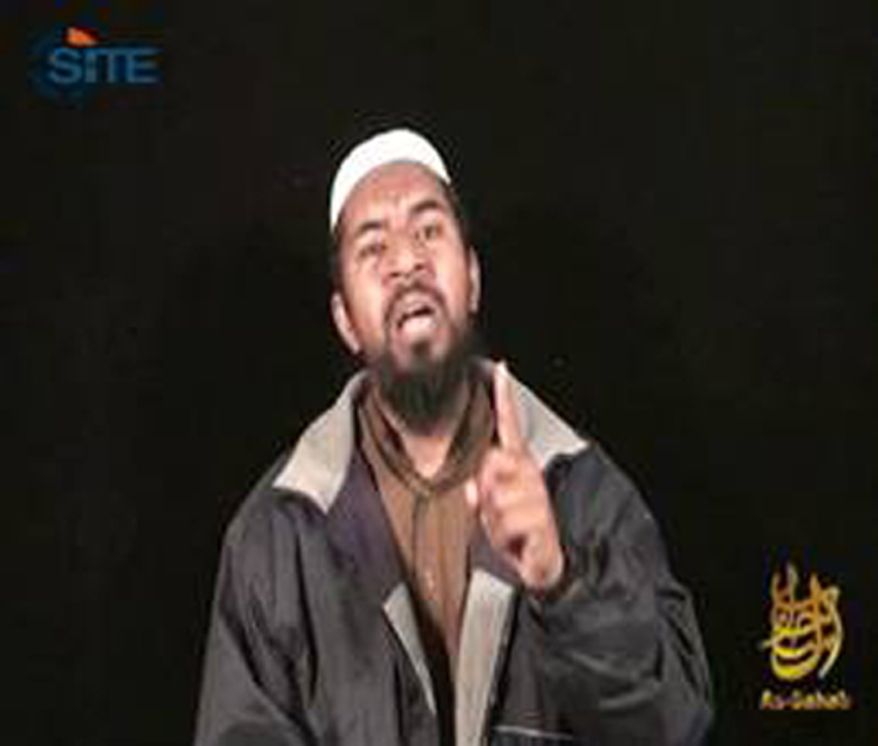 This image from video provided by the SITE Intelligence Group shows Abu Yahya al-Libi, an official in al Qaeda's Shariah Committee, addressing Libyans in a video speech released on jihadist forums on Saturday, March 12, 2011. (AP Photo/SITE Intelligence Group)