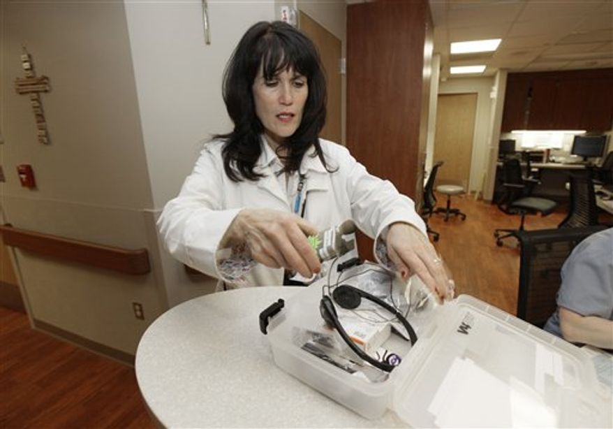 A upright chair with magnifying screen is shown in the Senior Emergency Room at St. Mary Mercy Hospital in Livonia, Mich., Thursday, March 10, 2011. Many hospitals run emergency rooms just for children's unique needs. Now a few are opening ERs specially designed for seniors, without all the confusion and clamor and with a little more comfort. (AP Photo/Paul Sancya)