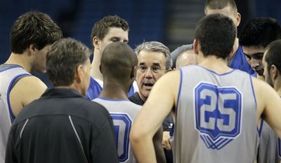 UC Santa Barbara head coach Bob Williams, center, talks with players at the end of practice Wednesday, March 16, 2010, in preparation for their second round southeast regional NCAA college basketball game in Tampa, Fla.  . UC Santa Barbara will face Florida. (AP Photo/John Raoux)