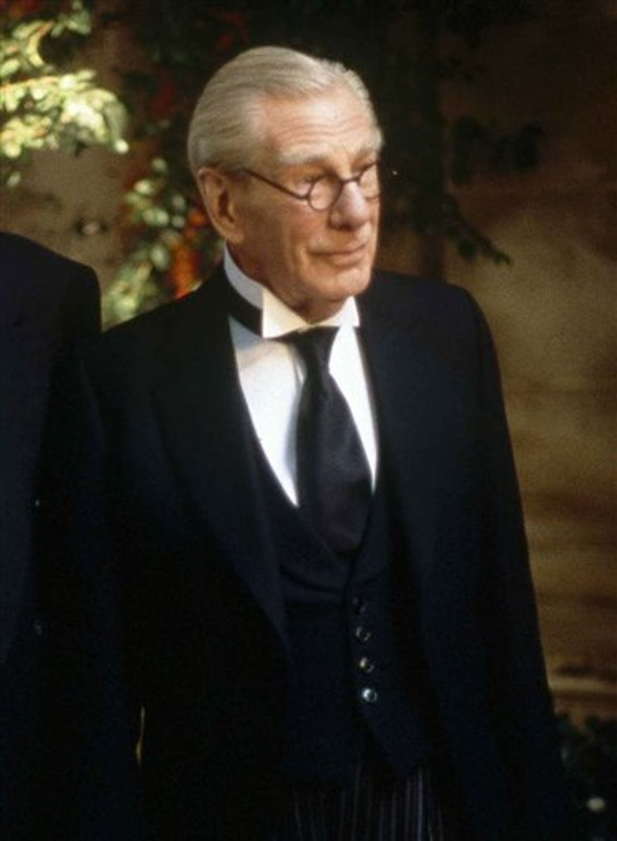 FILE - In this 1997 photo originally released by Warner Bros. Pictures, Michael Gough portrays Alfred, the trusted butler of Bruce Wayne in a scene from the movie "Batman and Robin." Gough, the British actor who performed in more than 150 movies and television shows, including British science-fiction show "Doctor Who," died at home in England on Thursday, March 17, 2011. He was 94. (AP Photo/Warner Bros. Pictures, Christine Loss)