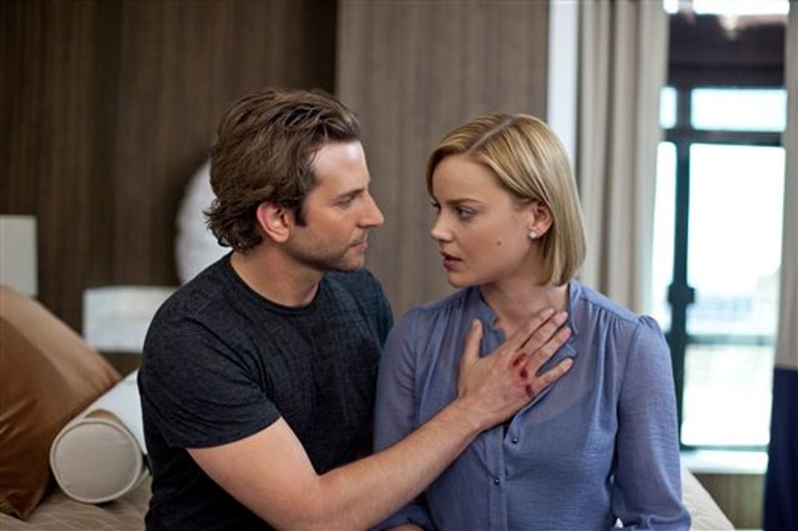 In this film publicity image released by Relativity Media, Bradley Cooper, left, and Abbie Cornish are shown in a scene from "Limitless." (AP Photo/Relativity Media, John Baer)