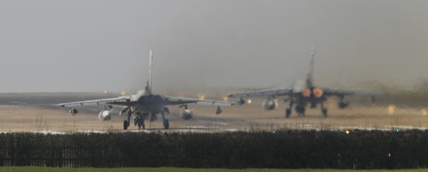 A British RAF Tornado takes off from RAF Marham, England, Monday, March, 21, 2011. The U.N. Security Council on Thursday approved a resolution backed by the U.S., Britain and France, authorizing the use of "all necessary measures" to protect civilians under attack by government forces in Libya. (AP Photo/Alastair Grant)