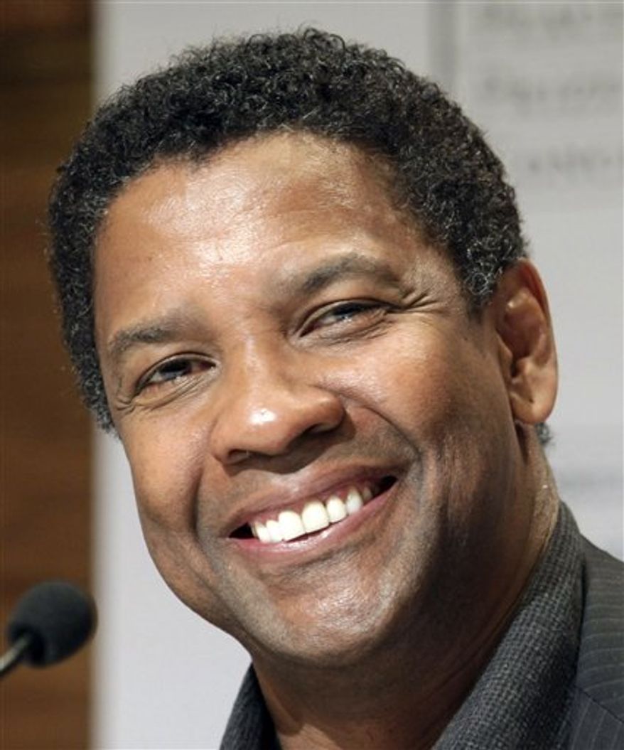 **FILE** Actor Denzel Washington speaks Dec. 11, 2010, at a press conference before a concert in honor of Nobel Peace Prize laureate Liu Xiaobo in Oslo. (Associated Press)