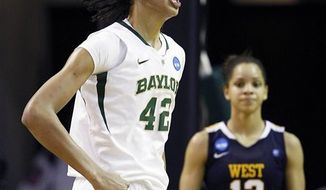 Baylor center Brittney Griner, right, blocks a shot attempt by West Virginia forward Madina Ali (44) in the first half of a second-round game of the NCAA women&#39;s college basketball tournament Tuesday, March 22, 2011, in Waco, Texas. (AP Photo/Tony Gutierrez)