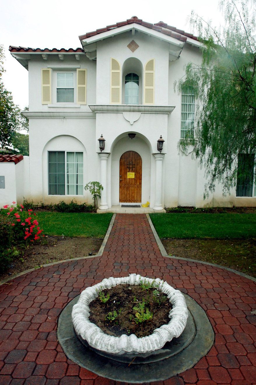 A house used as a maternity clinic is located in San Gabriel, Calif. Authorities shuttered it after discovering a makeshift maternity clinic tending to 10 newborns and a dozen Chinese women who paid as much as $35,000 to travel to Southern California to give birth to children who automatically qualify as U.S. citizens. (Associated Press)