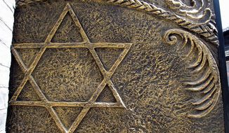 A star of David is displayed on a door in the courtyard of the Shanghai Jewish Refugees Museum. (Associated Press) ** FILE ** 