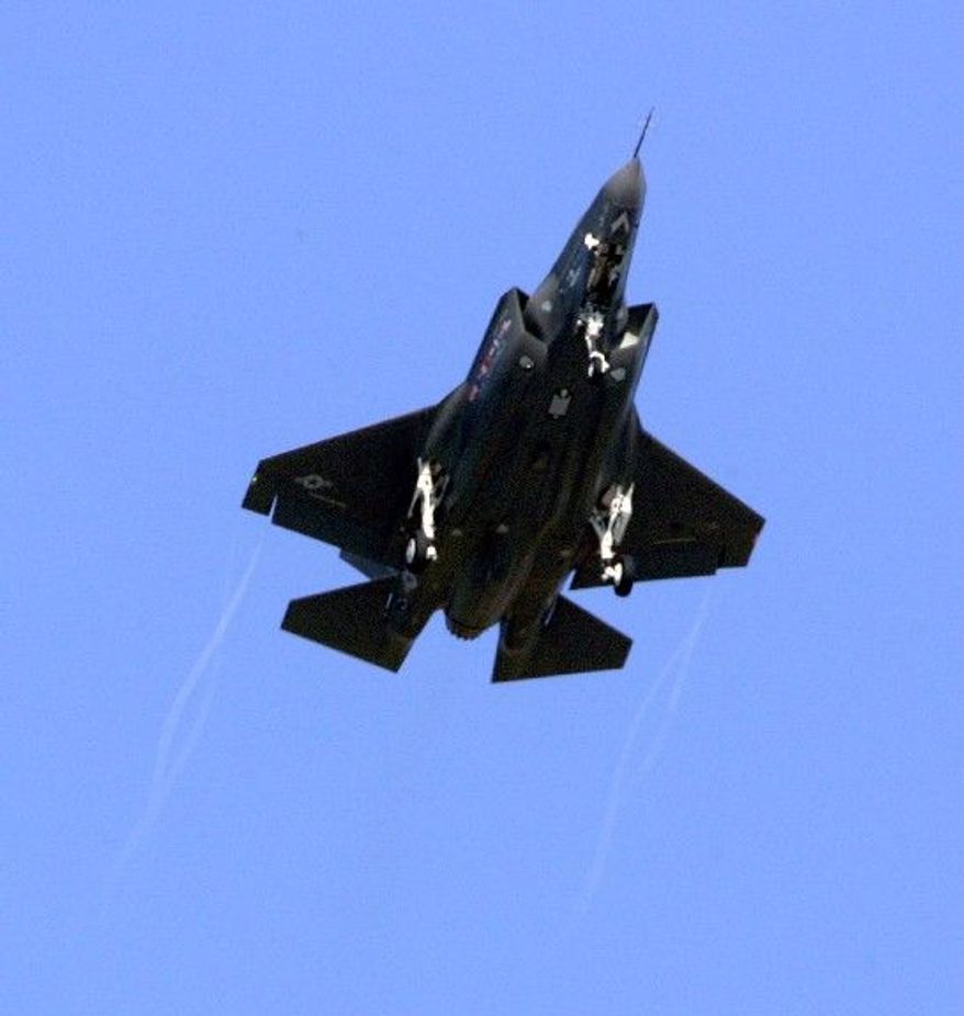POWERED DOWN: The alternate engine for the F-35 jet has been halted by a 90-day stop-work order. (Associated Press)