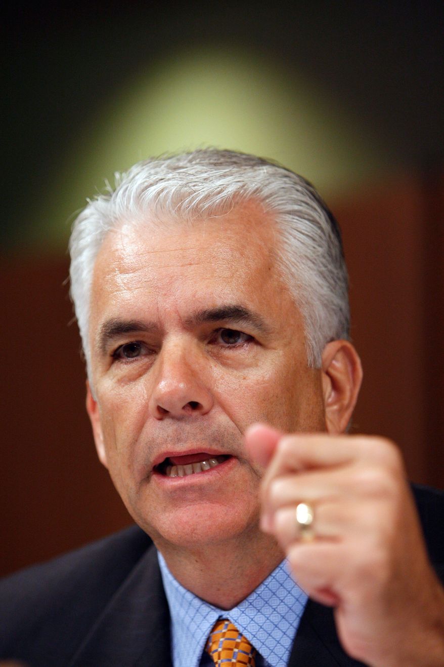 An ex-aide to Sen. John Ensign whose wife had an affair with the senator that damaged his career has been indicted for illegal lobbying. (Associated Press)