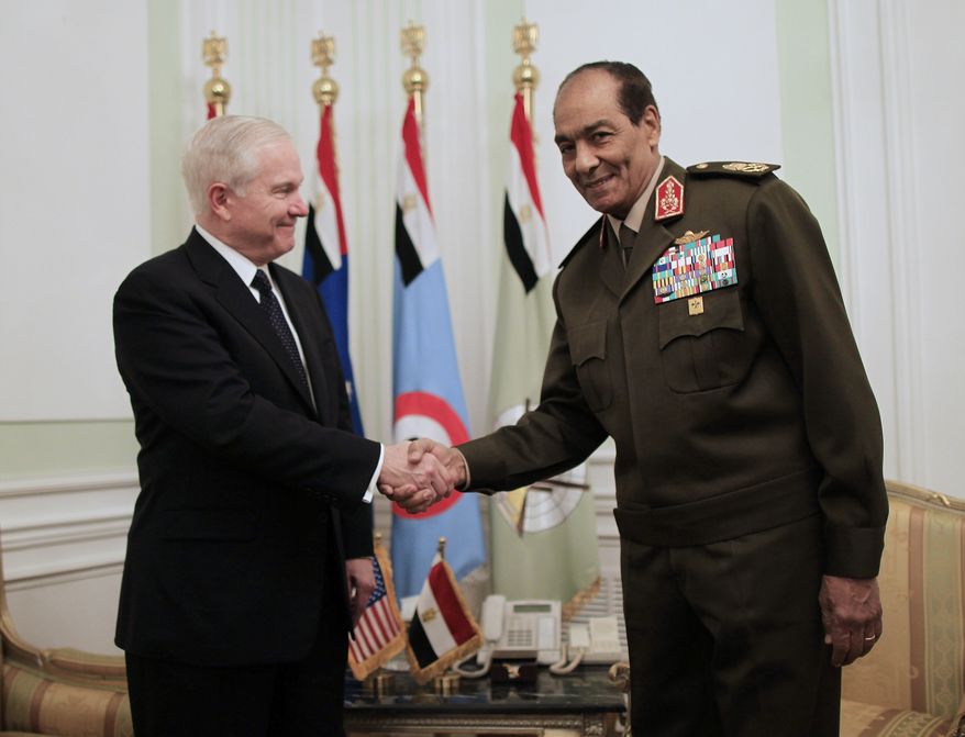 U.S. Defense Secretary Robert M. Gates (left) meets with Field Marshal Mohamed Hussein Tantawi, head of the Egyptian Armed Forces Supreme Council, in Cairo on Thursday, March 24, 2011. (AP Photo/Charles Dharapak, Pool)