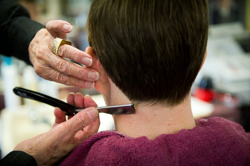 Chris Dietz( below) g ets the personal touch of Mr. D'Ambrosio. The price of a man's haircut has remained constant, at $20, which the hairstylist says keeps his clients coming back.