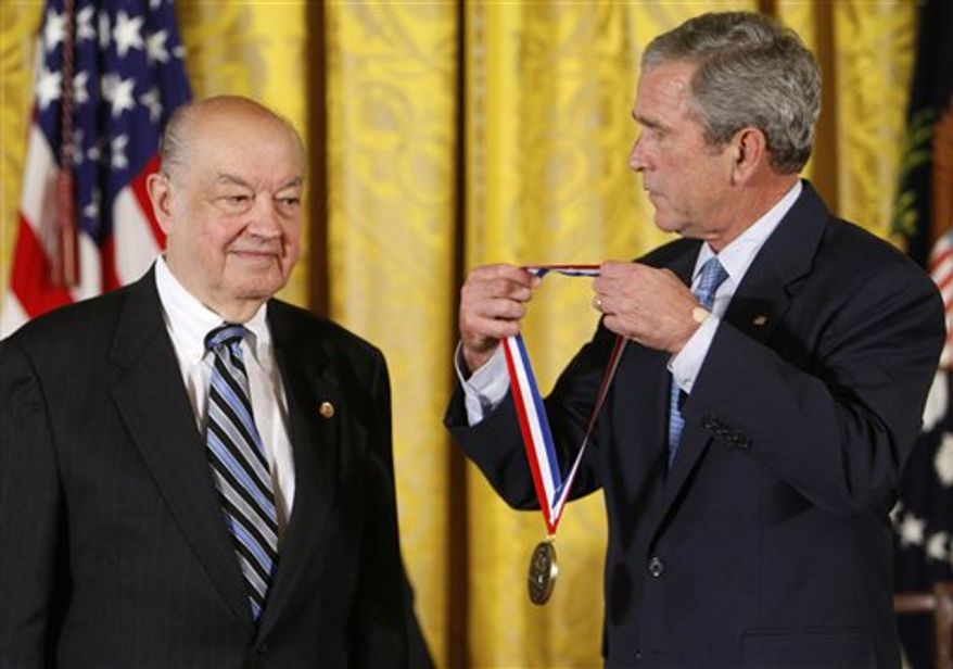 FILE -- In a Sept. 29, 2008 file photo then President Bush presents Paul Baran a 2007 National Medal of Technology and Innovation in the East Room of the White House in Washington. Baran whose work with packaging data in the 1960s has been credited with playing a key role in the later development of the Internet, died Saturday March 26, 2011 his son told The Associated Press. (AP Photo/Charles Dharapak/file)