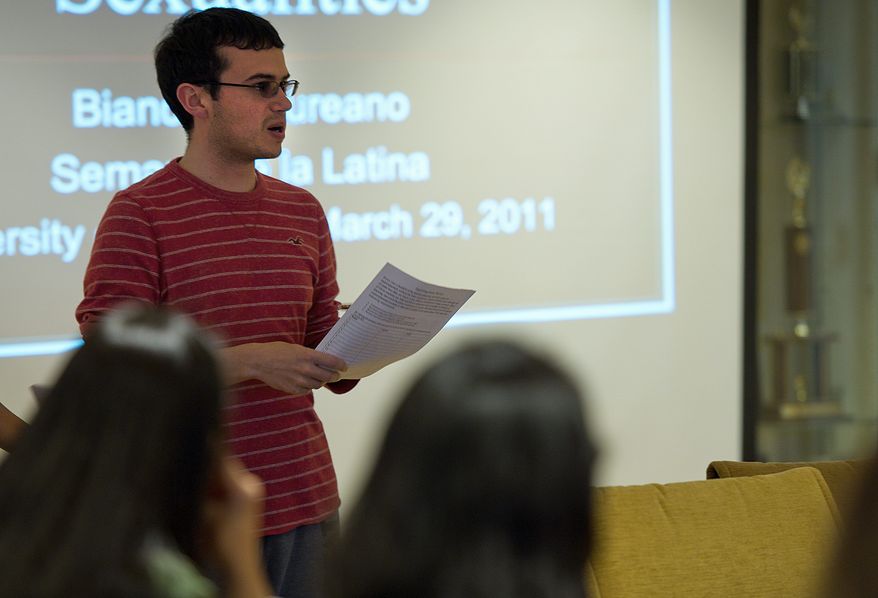 Speaking at a Semana de la Latina event Tuesday, University of Maryland senior Jacob Crider asks for support of a bill that would grant in-state tuition to many Maryland illegal immigrants. (Barbara L. Salisbury/The Washington Times)