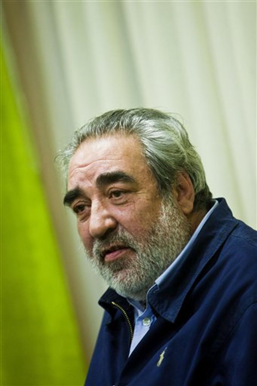 Portuguese architect Eduardo Souto de Moura speaks to journalists at a hotel in Lisbon Monday night, March 28, 2011, after it was announced that he had won the 2011Pritzker Architecture Prize. Souto de Moura, 58, joins Frank Gehry, Tadao Ando and Renzo Piano in receiving the honor that's often called architecture's Nobel Prize. (AP Photo/Miguel Manso, Publico) PORTUGAL OUT