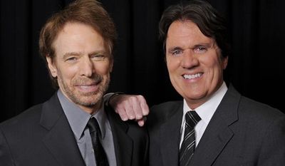 Jerry Bruckheimer, left, producer of the upcoming Disney film &quot;Pirates of the Caribbean: On Stranger Tides,&quot; poses with the film&#39;s director Rob Marshall backstage at CinemaCon 2011, Tuesday, March 29, 2011, in Las Vegas. (AP Photo/Chris Pizzello)