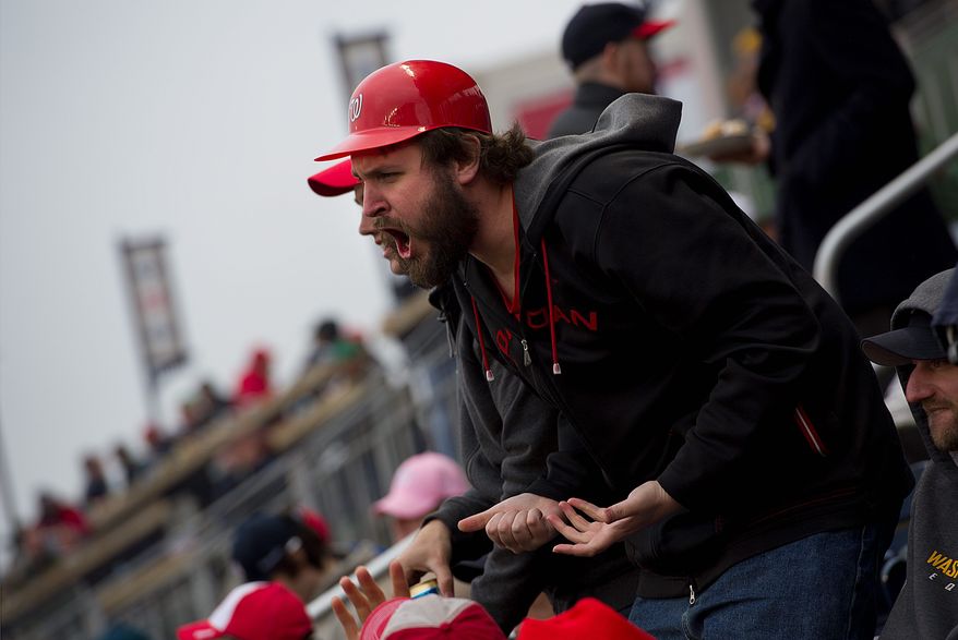 Pete Vogel of Falls Church shows his anger at one of the Nationals' plays in Thursday's 2-0 loss at Nationals Park. (Barbara L. Salisbury/The Washington Times)