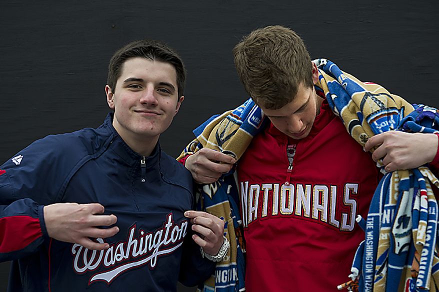 Robbie Thomas, left, and Alex Boyd, both 16 from Stafford, Va., took off school Thursday, March 31, 2011 to come to opening day at Nationals Park in Washington, D.C. (Barbara L. Salisbury/The Washington Times)