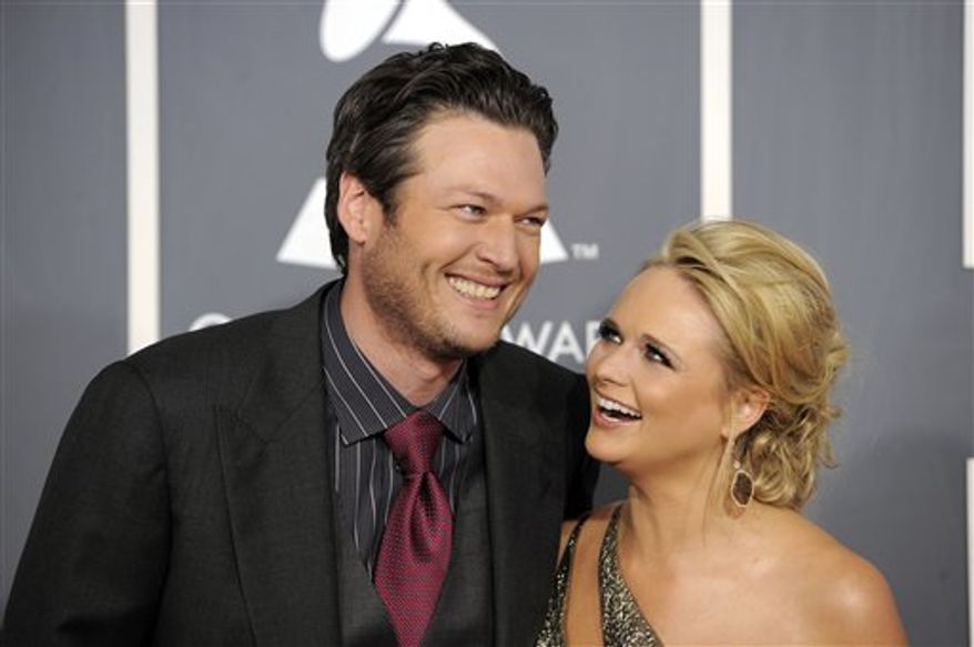 FILE - In this Feb. 13, 2011 file photo, Blake Shelton, left, and Miranda Lambert arrive at the 53rd annual Grammy Awards in Los Angeles. (AP Photo/Chris Pizzello, file)