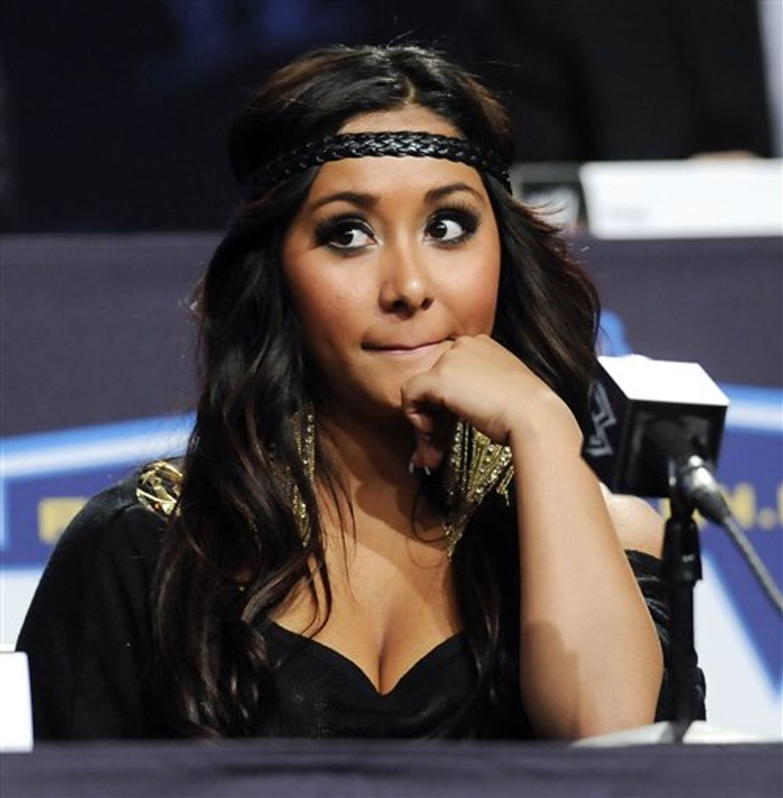 Reality television star Nicole "Snooki" Polizzi participates in a Wrestlemania XXVII press conference at the Hard Rock Cafe on Wednesday, March 30, 2011 in New York. (AP Photo/Evan Agostini)