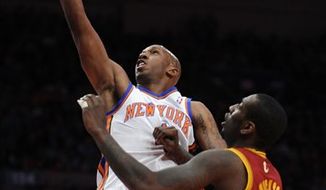New York Knicks&#39; Chauncey Billups shoots over Cleveland Cavaliers&#39; J.J. Hickson during the first half of NBA basketball game, Sunday, April 3, 2011, at Madison Square Garden in New York. (AP Photo/Stephen Chernin)