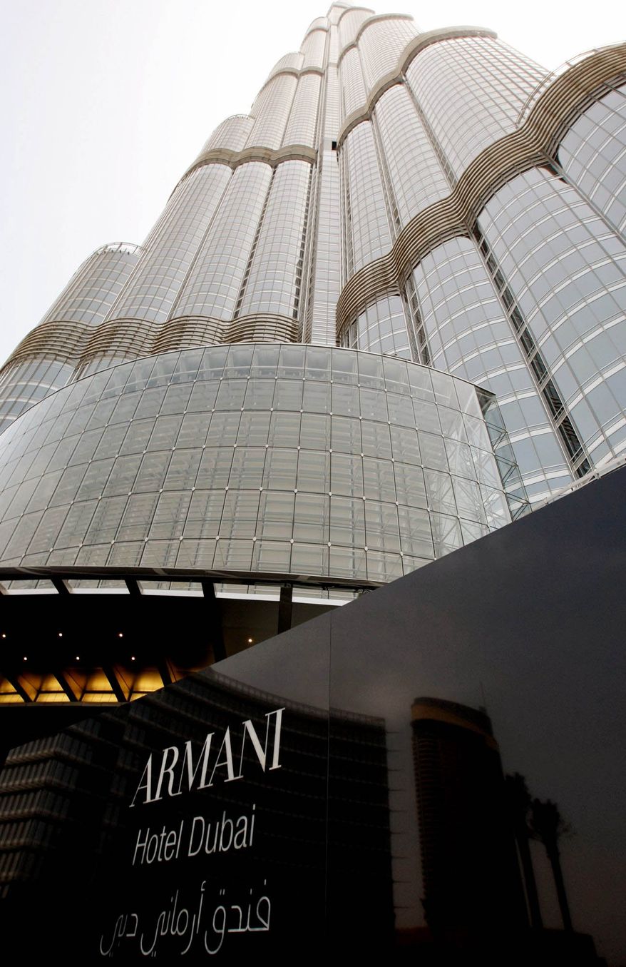 The world's first Armani Hotel in the Burj Khalifa, the world's tallest building, is located in Dubai, United Arab Emirates, where oil production and sales are likely to benefit from the political upheavals in neighboring countries. (Associated Press)