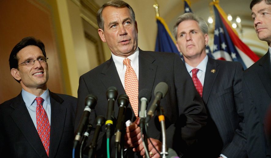 BLUEPRINT: House Speaker John A. Boehner, flanked by House Majority Leader Eric Cantor (left) and Majority Whip Kevin McCarthy talks with reporters after the 2012 budget outline. (Rod Lamkey Jr./The Washington Times)