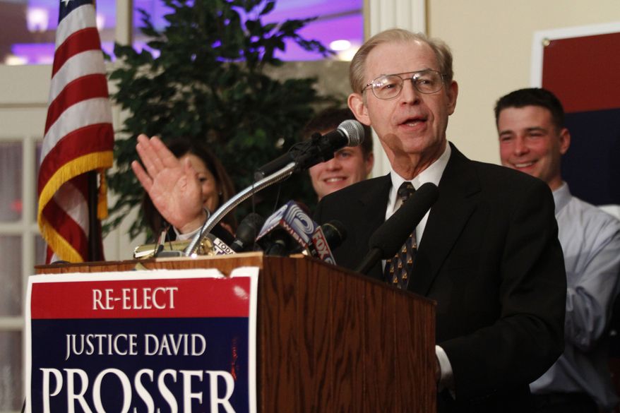 Wisconsin Supreme Court Justice David Prosser, a Republican, speaks to supporters at the Seven Seas Restaurant in Waukesha, Wis., on Tuesday, April 5, 2011. As of Wednesday morning, Justice Prosser was trailing his opponent, state Assistant Attorney General JoAnne Kloppenburg, who is a Democrat, by 224 votes in Tuesday&#39;s balloting. (AP Photo/Darren Hauck)