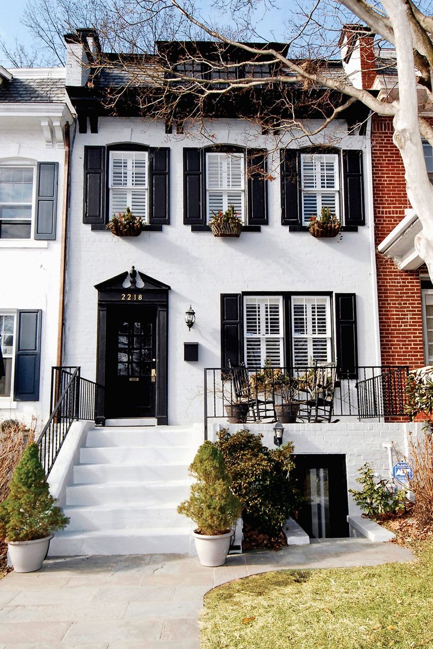 The home at 2218 Cathedral Ave. NW in Woodley Park is on the market for $1,198,555. The row home, built in 1923 and renovated in 2008, faces Rock Creek Park.