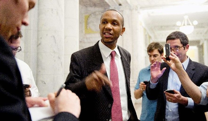 OPTS OUT: Former mayoral candidate Sulaimon Brown speaks to reporters in the John A. Wilson Building lobby Thursday during a hearing on the personnel practices of Mayor Vincent C. Gray's administration. He chose not to testify. (Barbara L. Salisbury/The Washington Times)