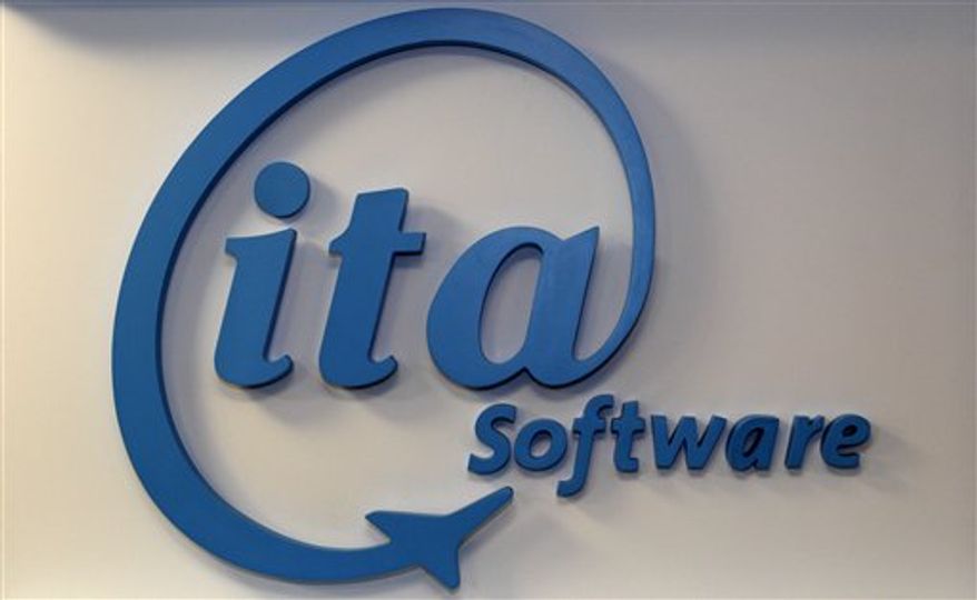 In this Feb. 9, 2011 photo, the logo of ITA Software is displayed at the company's office in Cambridge, Mass. Government officials are letting Google proceed with its $700 million purchase of airline fare tracker ITA Software. The deal will establish the Internet search giant as a key player in the online travel market.(AP Photo/Charles Krupa)
